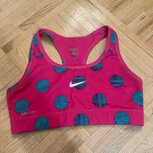 pink and blue small nike sports bra